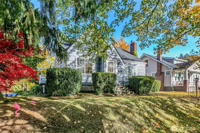 a front view of a house with yard