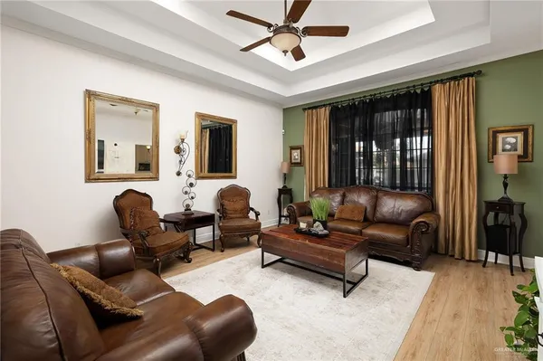 a living room with furniture and a window