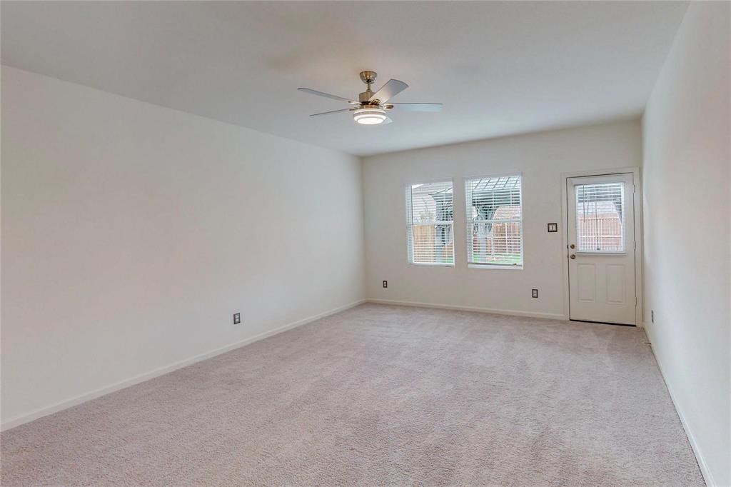 407 Madison Way Princeton, TX 75407 - Photo 11 of 40 Unfurnished room with light carpet and a ceiling fan