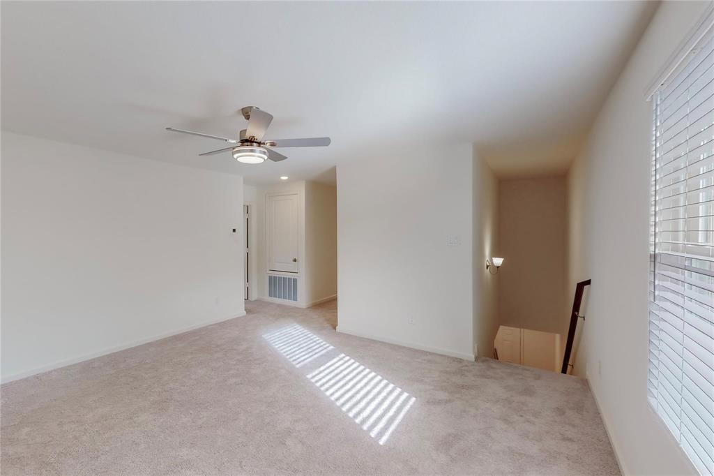407 Madison Way Princeton, TX 75407 - Photo 30 of 40 Unfurnished room with light carpet and ceiling fan