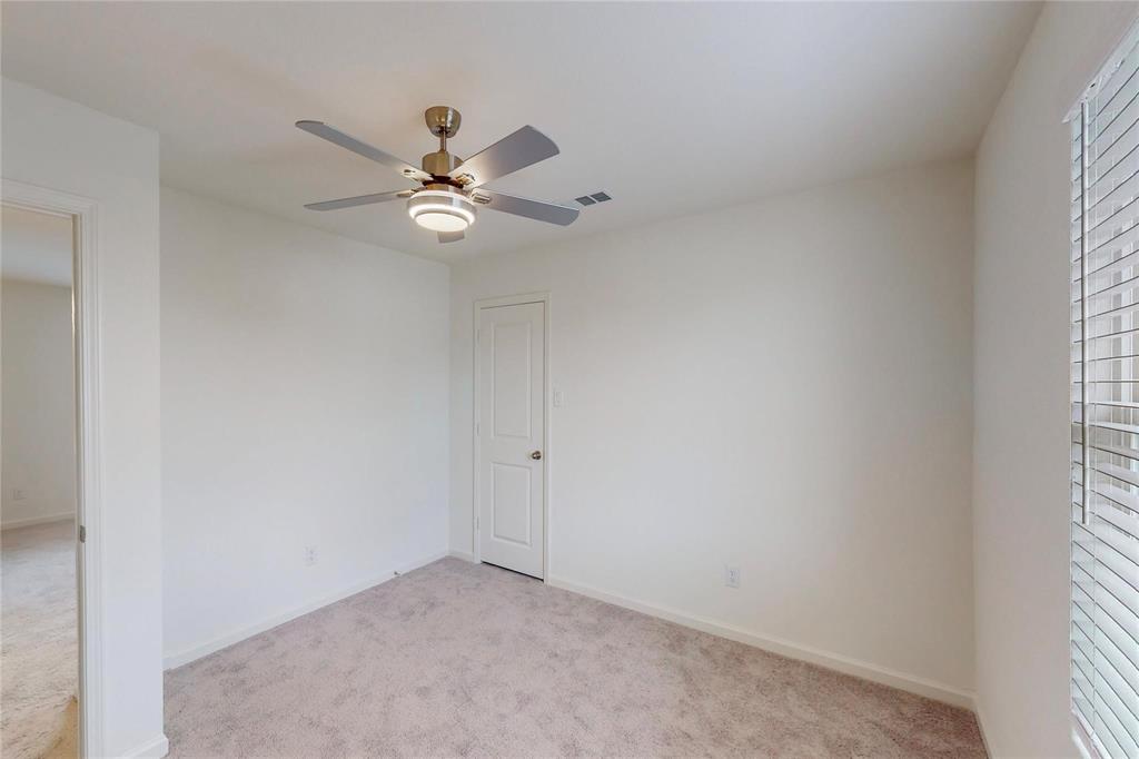 407 Madison Way Princeton, TX 75407 - Photo 32 of 40 Unfurnished room with light carpet and ceiling fan