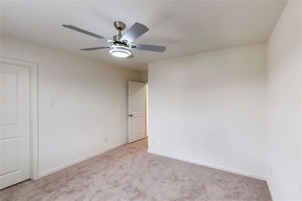 407 Madison Way Princeton, TX 75407 - Photo 8 of 40 Spare room featuring light carpet and ceiling fan