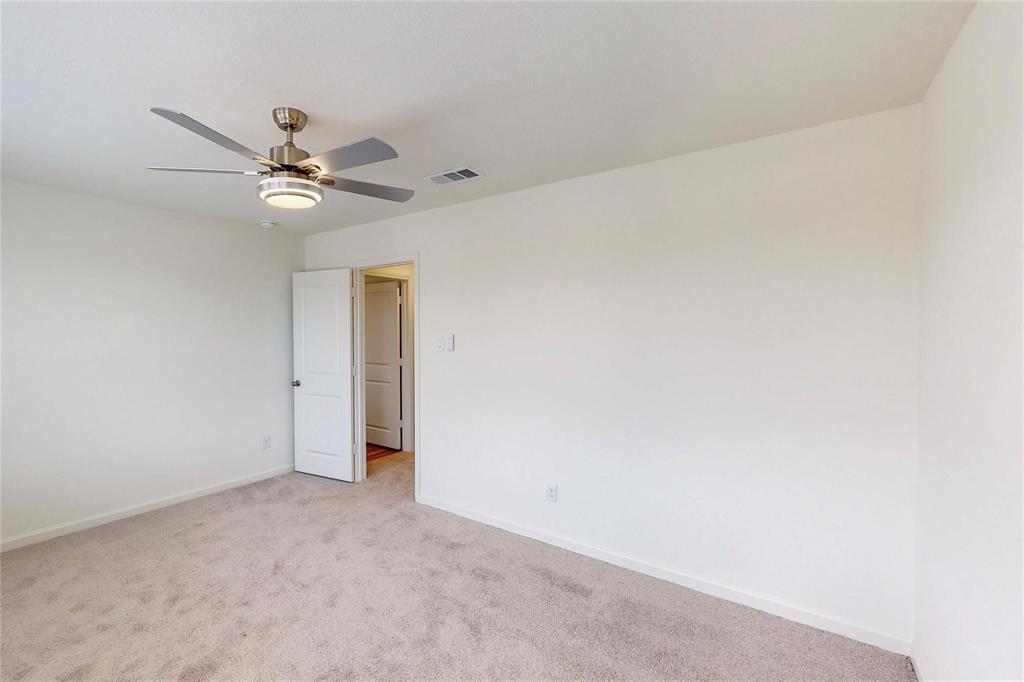 407 Madison Way Princeton, TX 75407 - Photo 10 of 40 Unfurnished room featuring light carpet and a ceiling fan