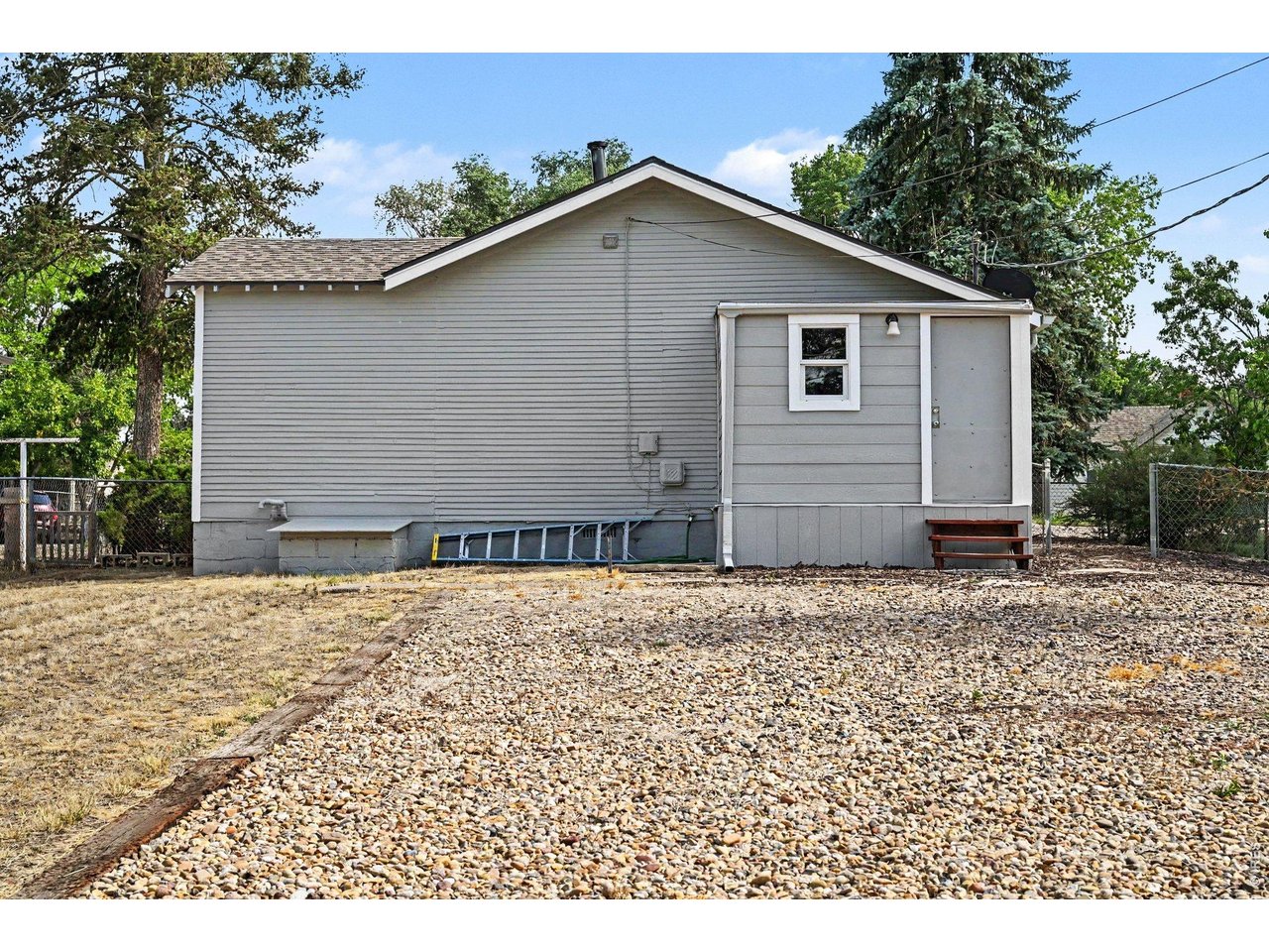 427 9th Street Greeley, CO 80631 - Photo 21 of 22 a backyard of a house