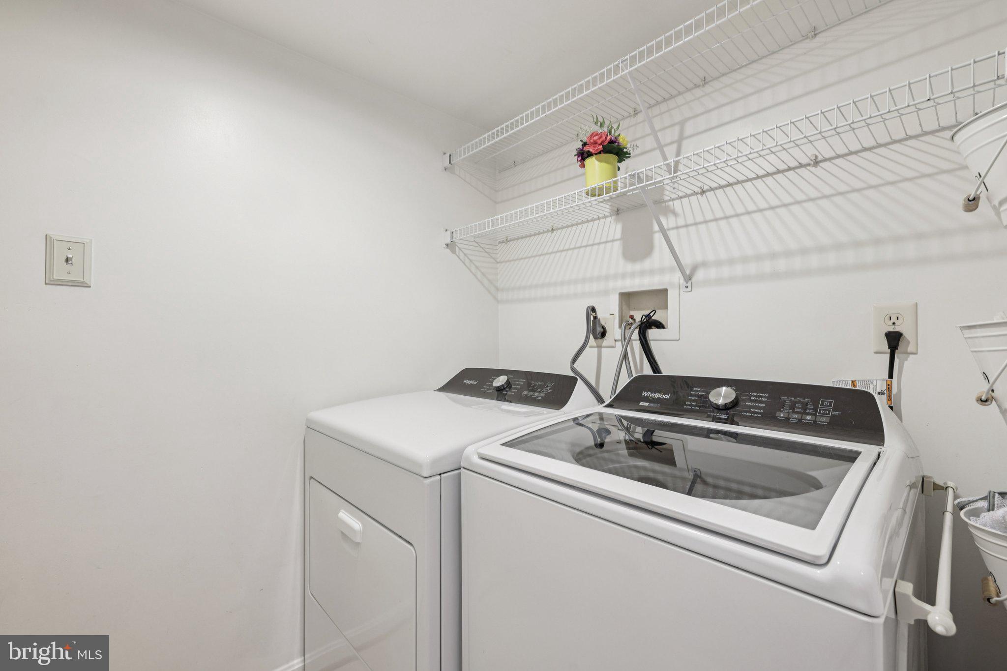 3044 Old Channel Road Laurel, MD 20724 - Photo 9 of 27 Modern laundry space with shelving, main level