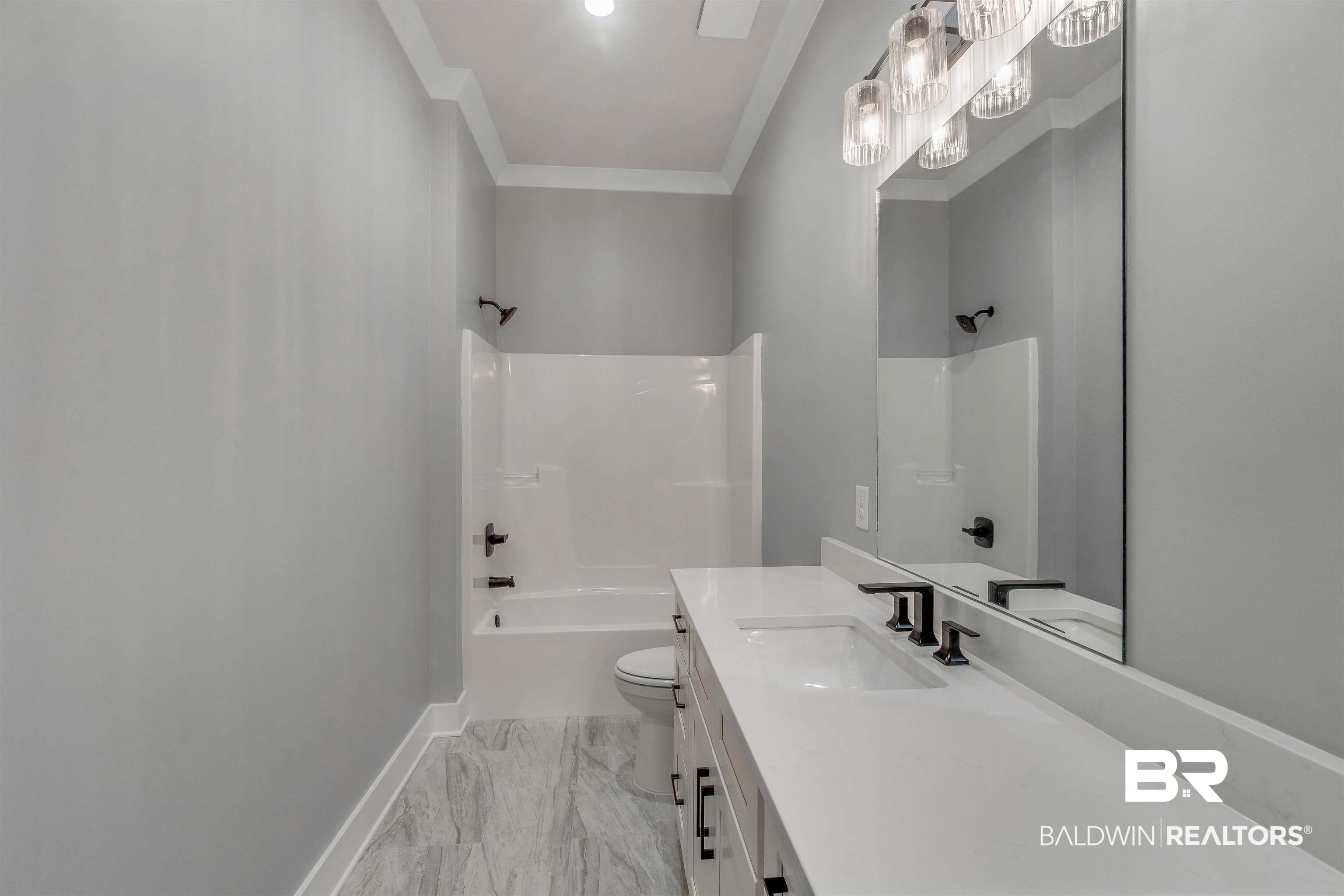 10985 Atrium Avenue Fairhope, AL 36532 - Photo 35 of 58 Full bathroom featuring bathing tub / shower combination, vanity, and ornamental molding