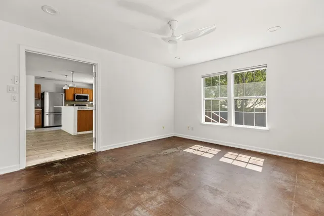 an empty room with windows