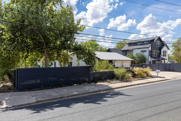 an outdoor view of house with yard