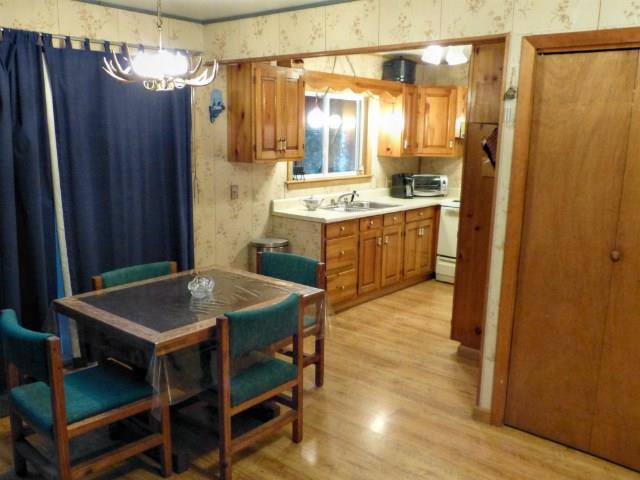 557 Phinney Farm Road Lincoln, ME 04457 - Photo 18 of 32 Bright kitchen and dining area.