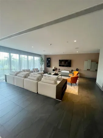 a view of barbeque area with outdoor seating