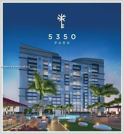 a view of pool with lawn chairs and plants