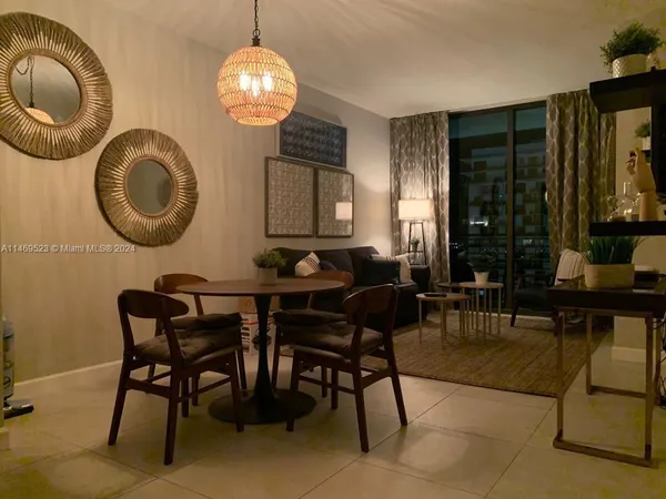 a view of a dining room with furniture