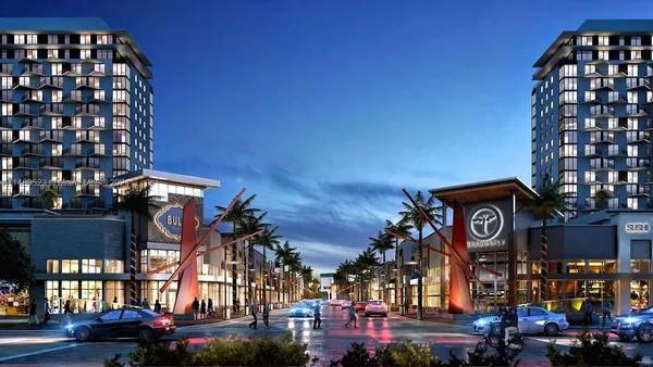 a view of a living room and hardwood floor
