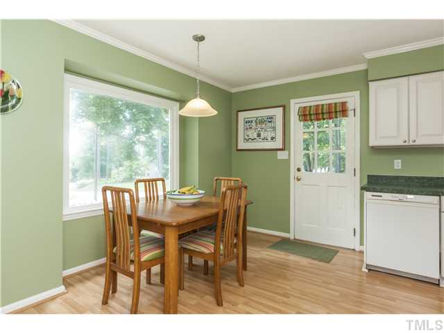 5609 Knollwood Road Raleigh, NC 27609 - Photo 11 of 25 a view of a dining room with furniture window and outside view