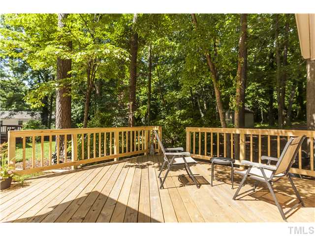 5609 Knollwood Road Raleigh, NC 27609 - Photo 20 of 25 a view of balcony with wooden floor and fence