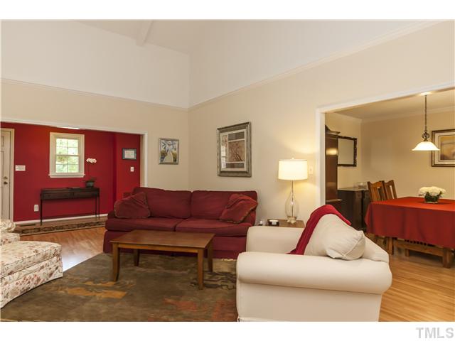 5609 Knollwood Road Raleigh, NC 27609 - Photo 6 of 25 a living room with furniture and wooden floor