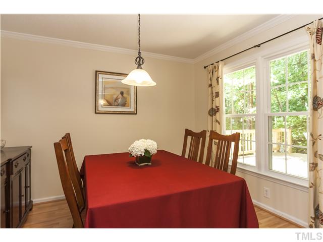 5609 Knollwood Road Raleigh, NC 27609 - Photo 7 of 25 a view of a dining room with furniture window and outside view