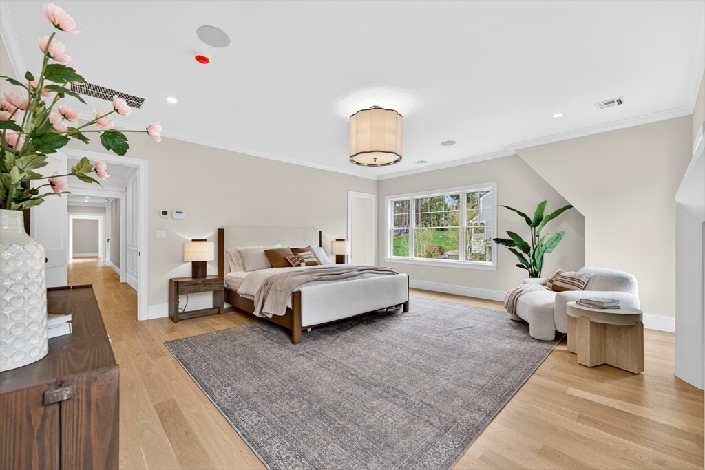 8 Crestview Road Needham, MA 02492 - Photo 14 of 30 a spacious bedroom with a bed and a couch