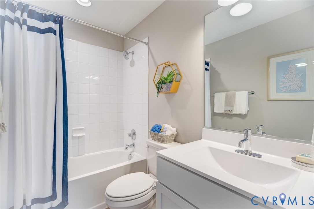 16000 Canoe Pointe Loop, Unit 164 Moseley, VA 23120 - Photo 29 of 29 a bathroom with a sink toilet and shower