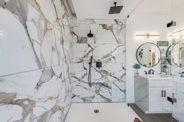 a bathroom with a bathtub and a sink