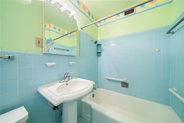 a living room with a rug