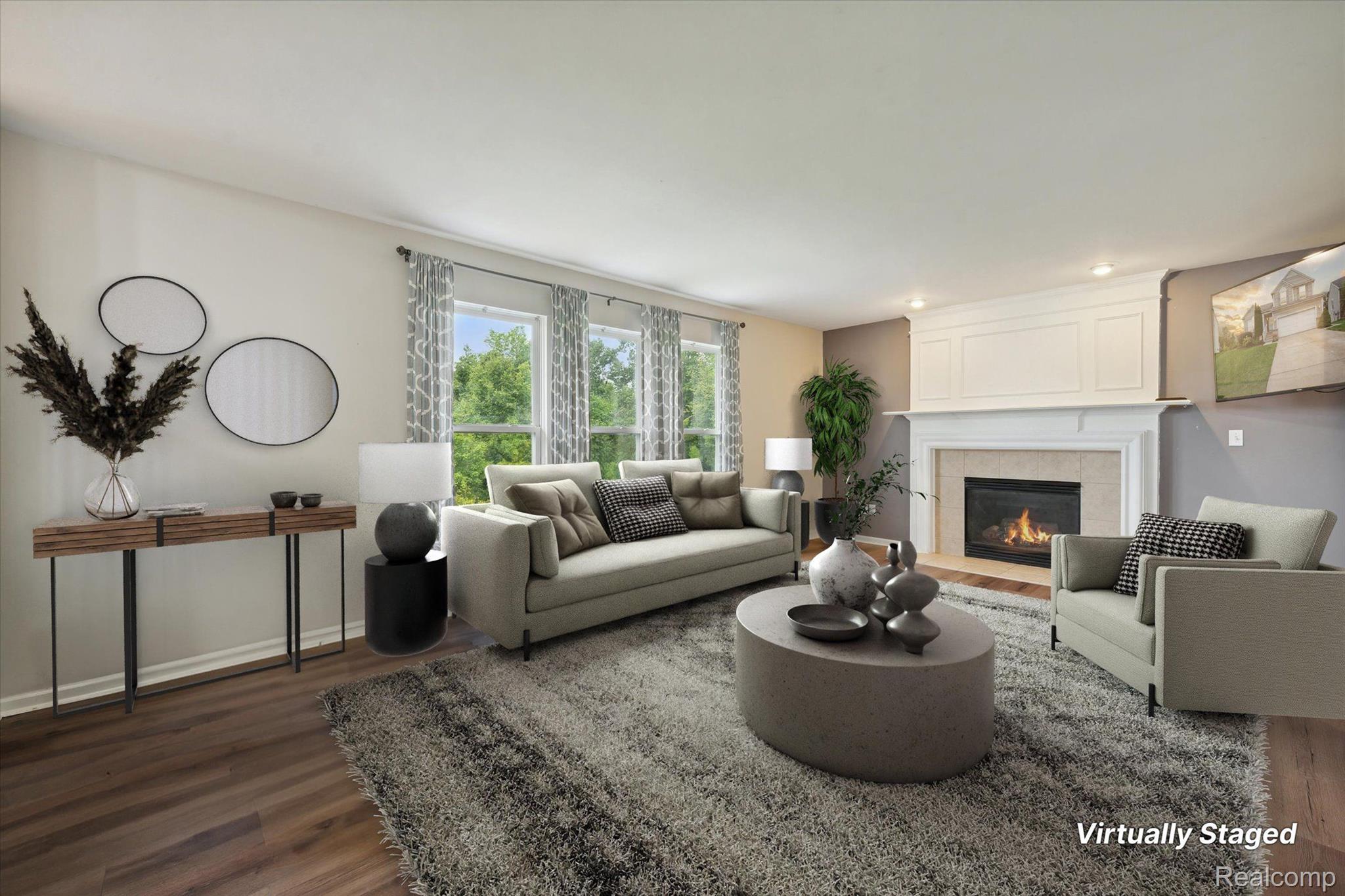 964 Callaway Court Howell, MI 48843 - Photo 14 of 44 Cozy up to this fireplace this winter!
