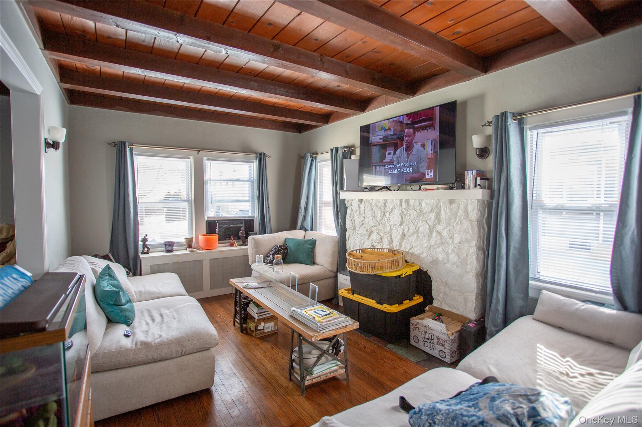 261 Rutland Road Freeport, NY 11520 - Photo 6 of 15 a living room with furniture and a window