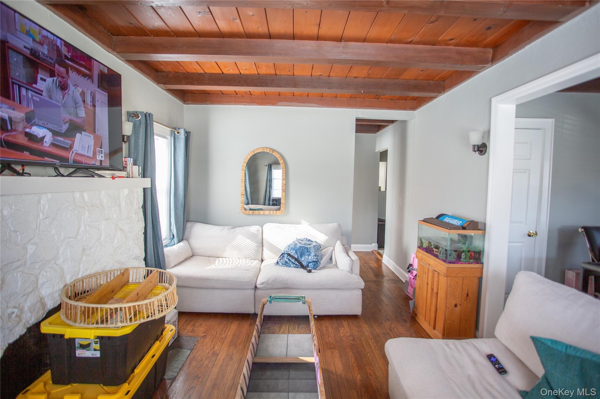 261 Rutland Road Freeport, NY 11520 - Photo 9 of 15 a living room with furniture and a table