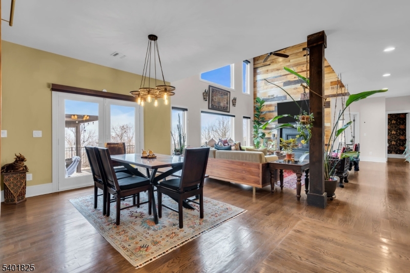 846 Sunset Ridge Bridgewater, NJ 08807 - Photo 16 of 50 a dining room with furniture a chandelier and wooden floor