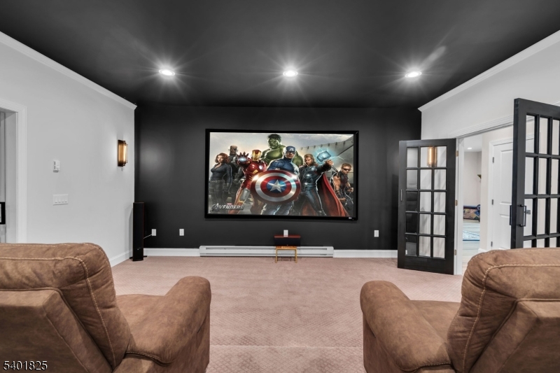 846 Sunset Ridge Bridgewater, NJ 08807 - Photo 42 of 50 a living room with furniture and a flat screen tv