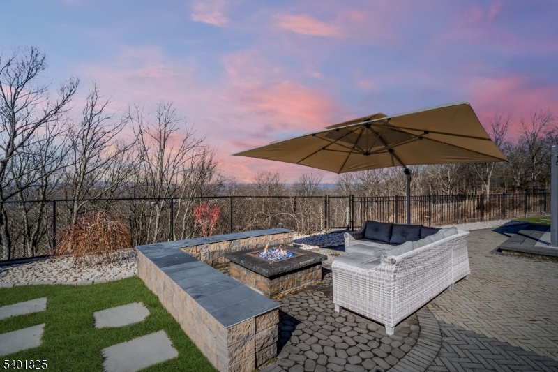 846 Sunset Ridge Bridgewater, NJ 08807 - Photo 46 of 50 a view of a couches and dinning table and chairs in backyard