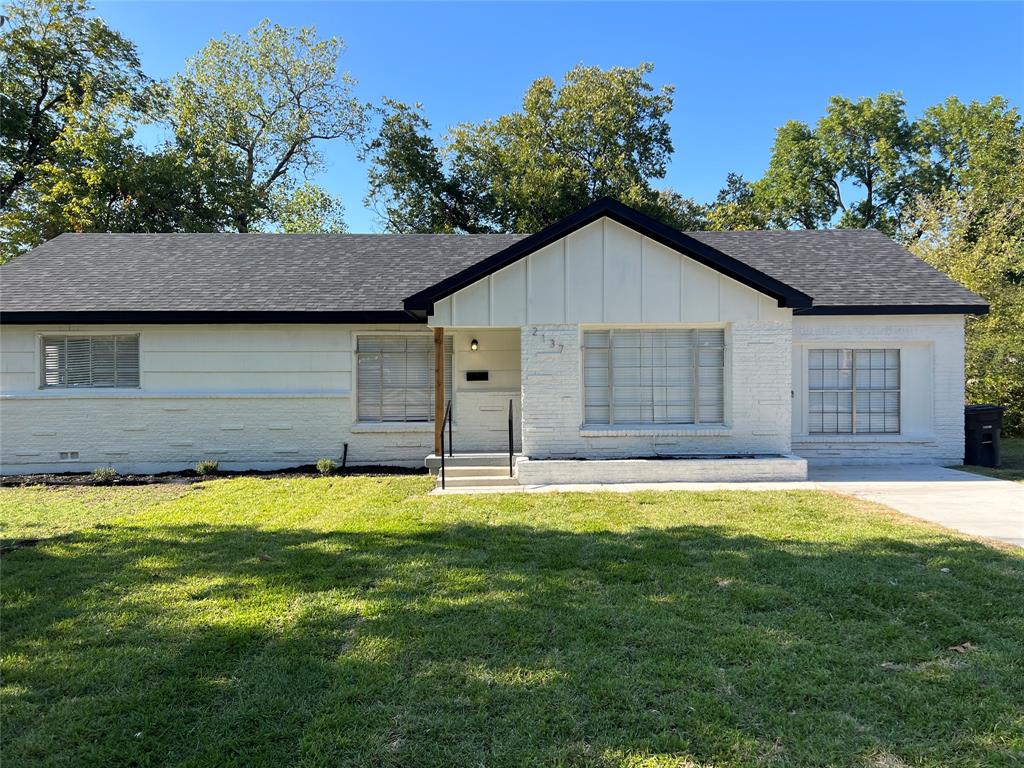 2137 Ridgeview Street Fort Worth, TX 76119 - Photo 1 of 1 a house that has a big yard