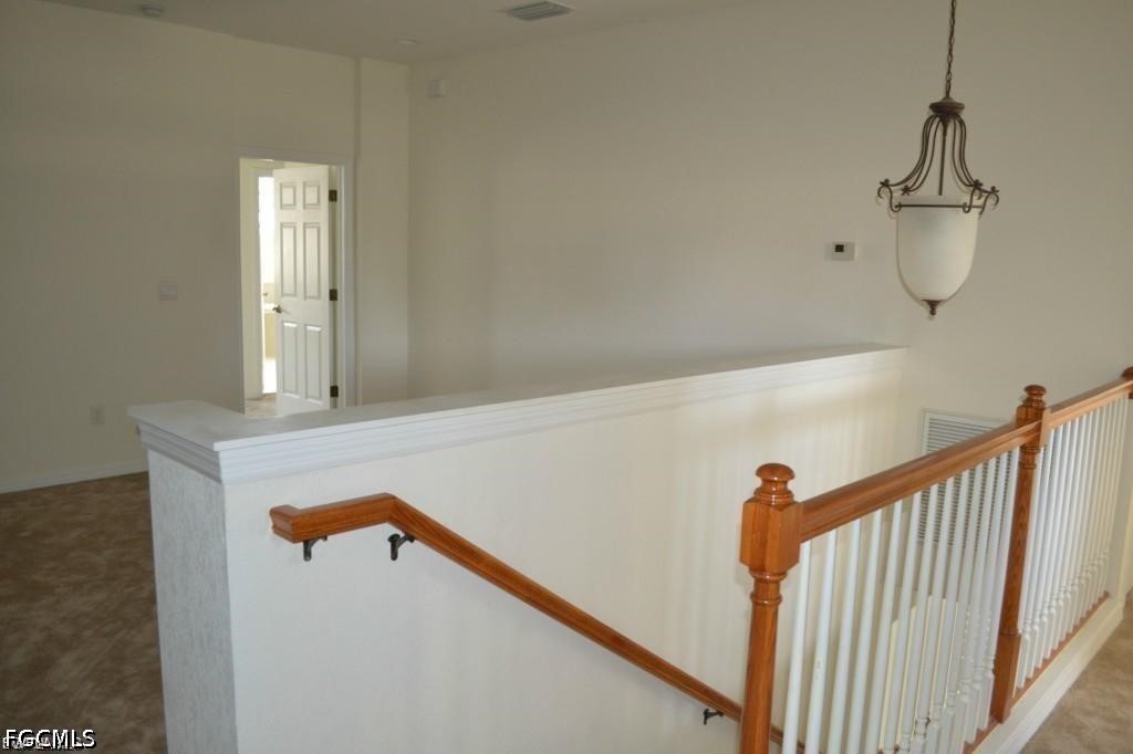 20561 Larino Loop Estero, FL 33928 - Photo 11 of 26 a view of a hallway with entryway