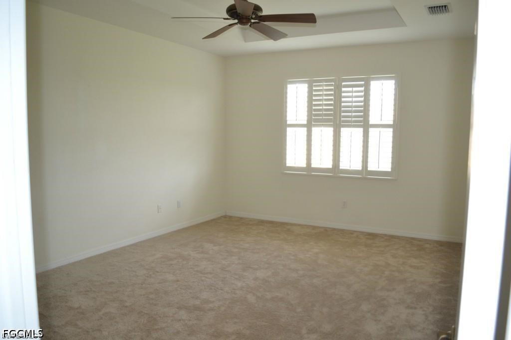 20561 Larino Loop Estero, FL 33928 - Photo 15 of 26 an empty room with a window