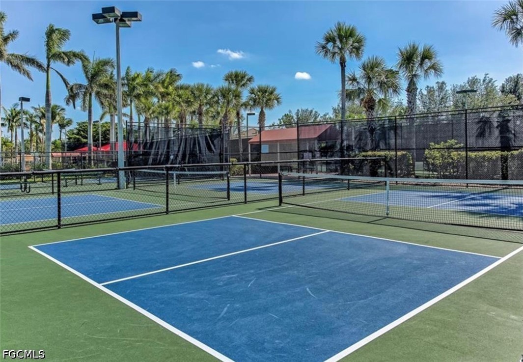 20561 Larino Loop Estero, FL 33928 - Photo 24 of 26 a view of a tennis court