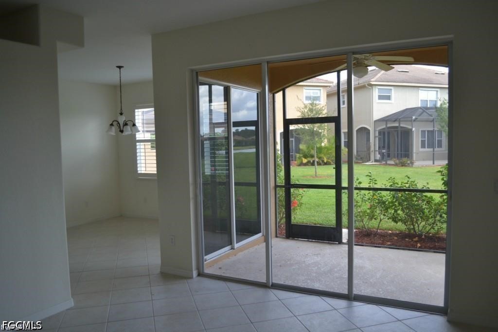 20561 Larino Loop Estero, FL 33928 - Photo 3 of 26 a bathroom with a glass door and shower