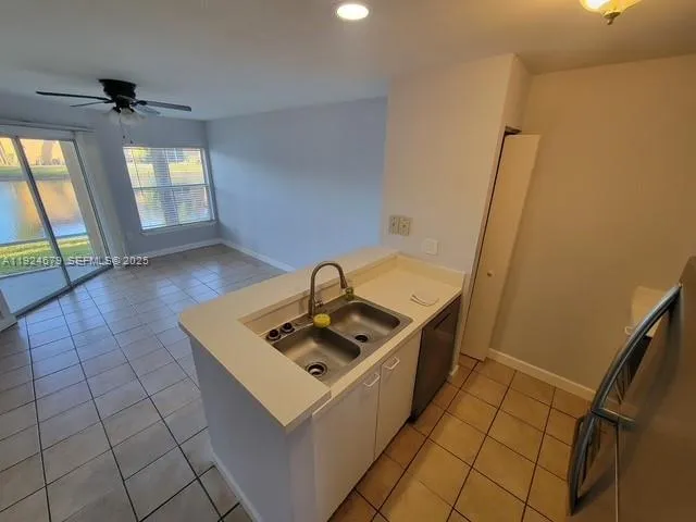 a view of a kitchen with an entryway