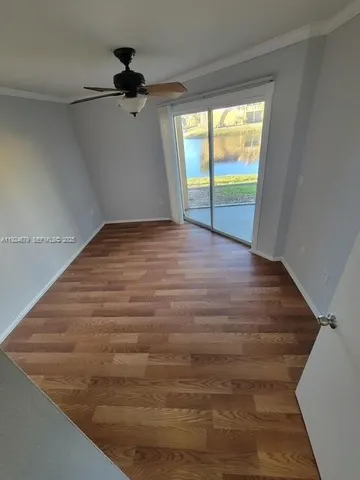 a view of an empty room and window