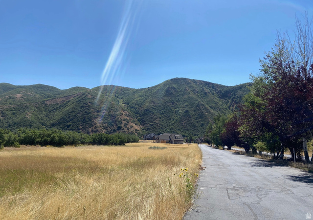131 Meadow Drive, Unit 20 Springville, UT 84663 - Photo 2 of 33 Mountain view with rural landscape