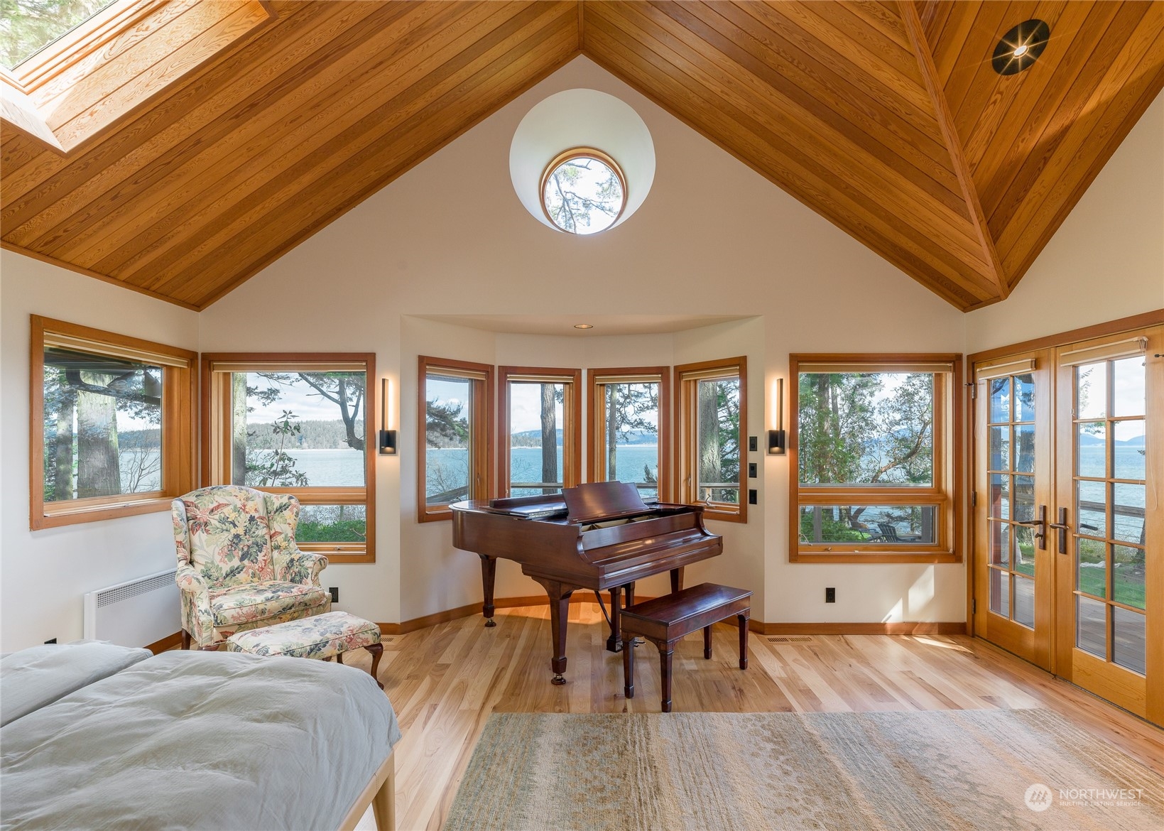 777 Eliza Road Lopez Island, WA 98261 - Photo 19 of 38 a living room with furniture and a large window