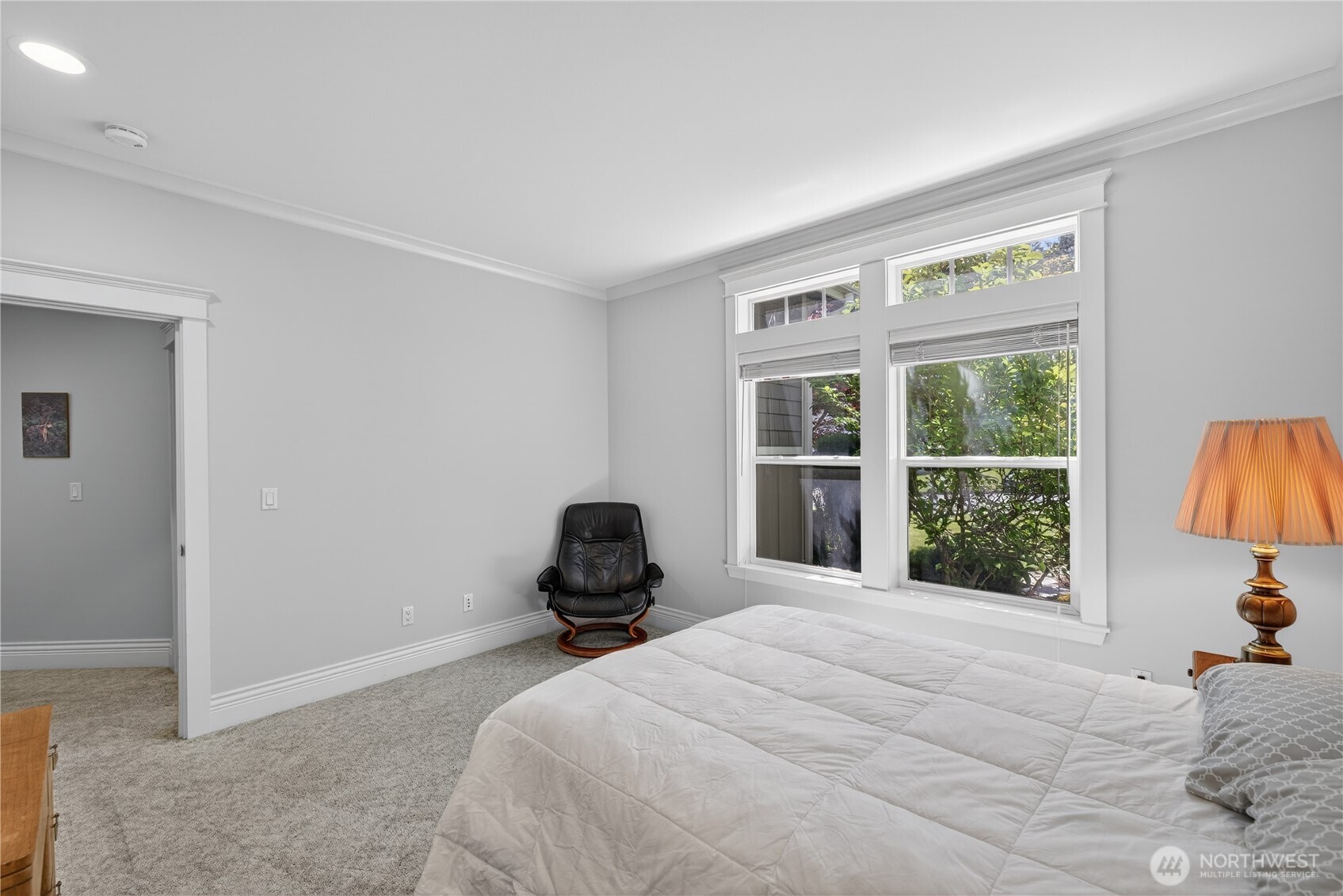 1908 29th Place Anacortes, WA 98221 - Photo 26 of 40 a bedroom with a bed and a large window