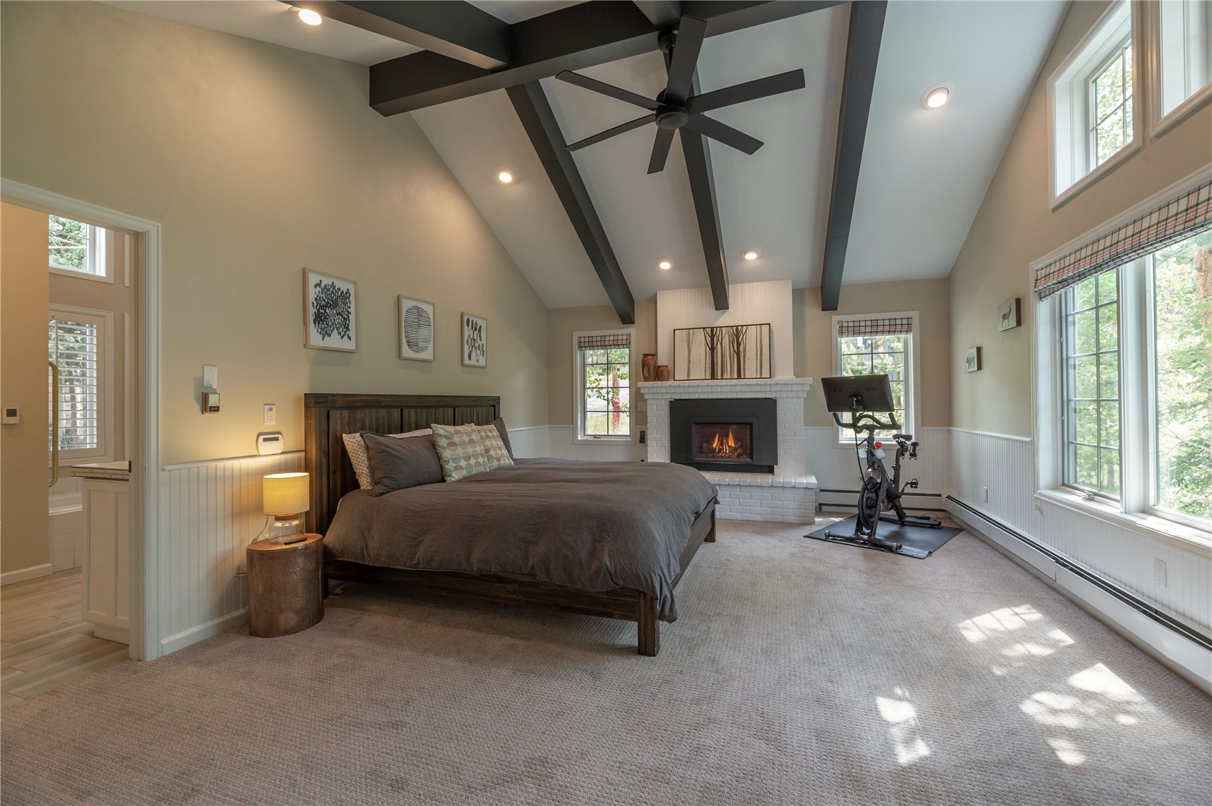 48 Keystone Ranch Golf Service Road Keystone, CO 80435 - Photo 22 of 49 Primary Bedroom with a fireplace and views overlooking open space