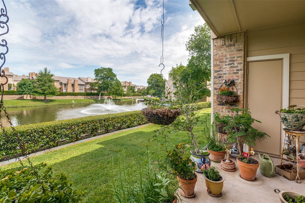 14277 Preston Road, Unit 1012 Dallas, TX 75254 - Photo 9 of 13 Covered patio facing the beautiful community lake with water feature.