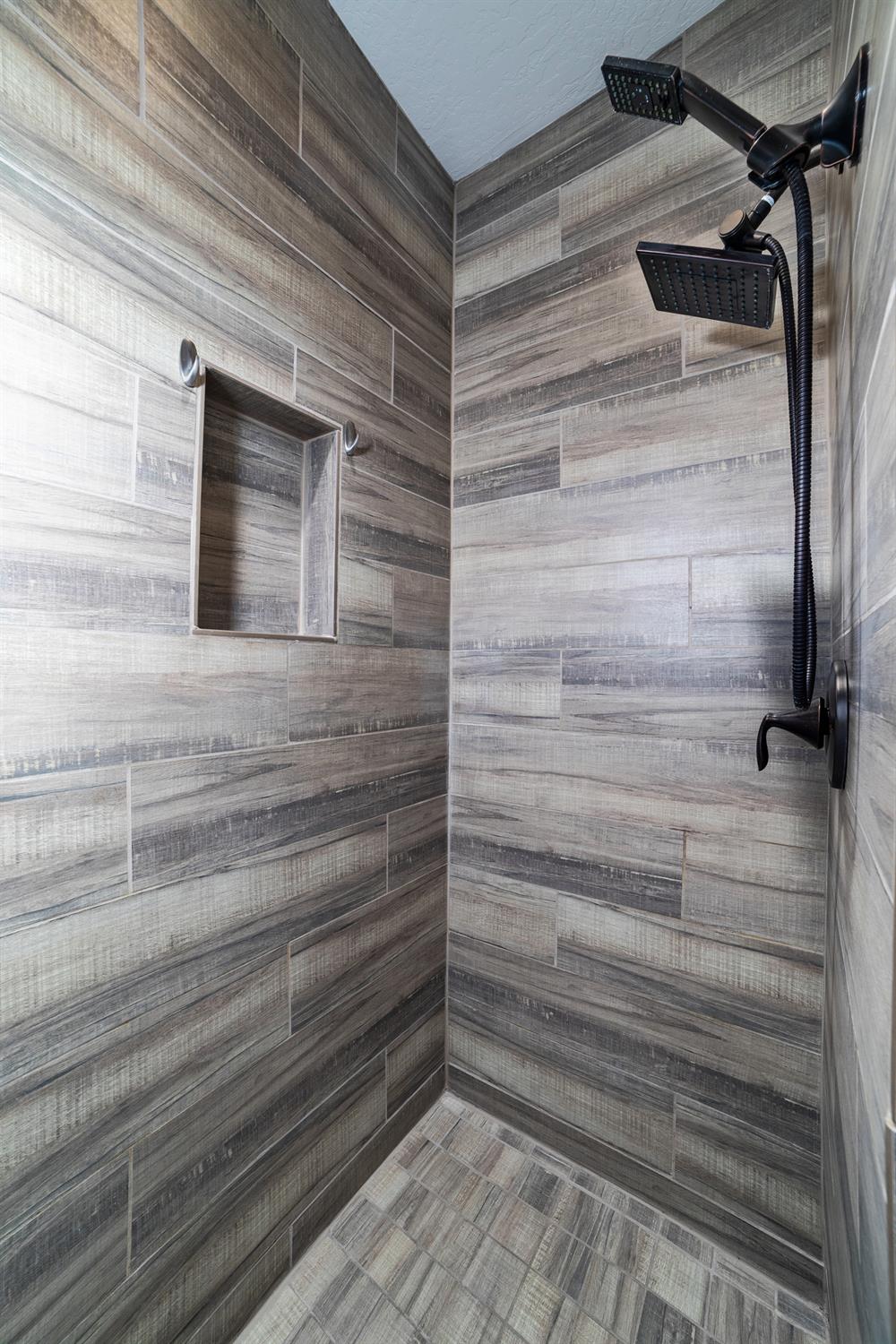 1374 South Enns Avenue Reedley, CA 93654 - Photo 25 of 48 a bathroom with a shower