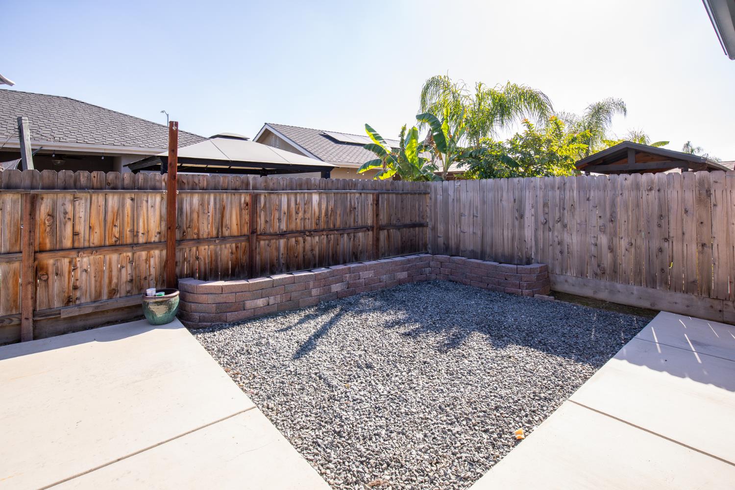 1374 South Enns Avenue Reedley, CA 93654 - Photo 33 of 48 a view of a backyard