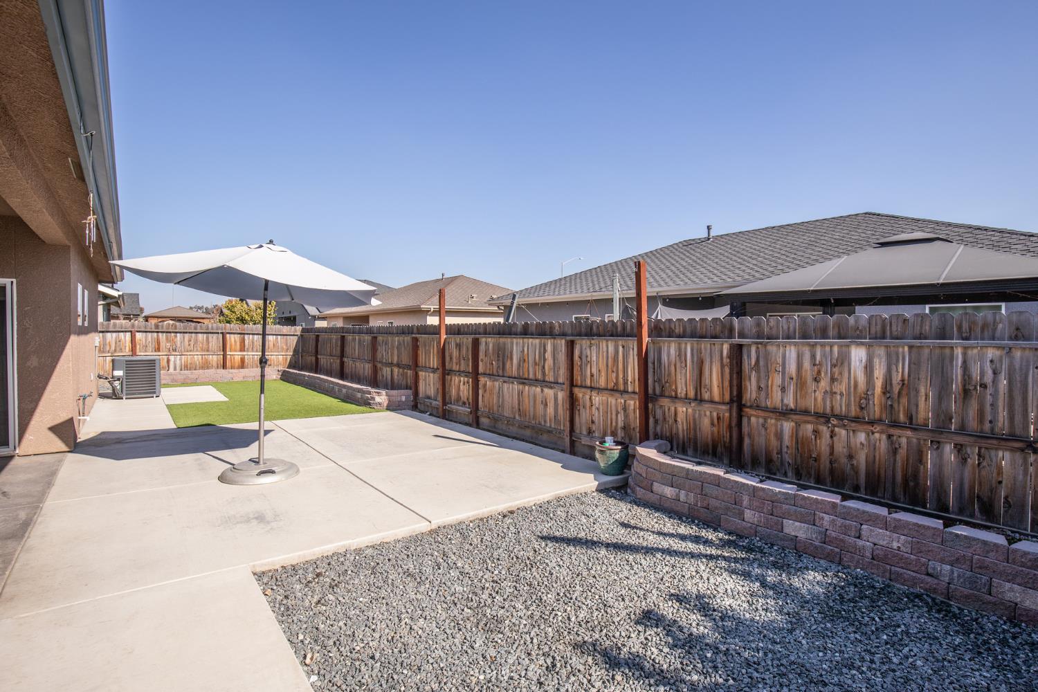 1374 South Enns Avenue Reedley, CA 93654 - Photo 36 of 48 a view of a backyard with a tub