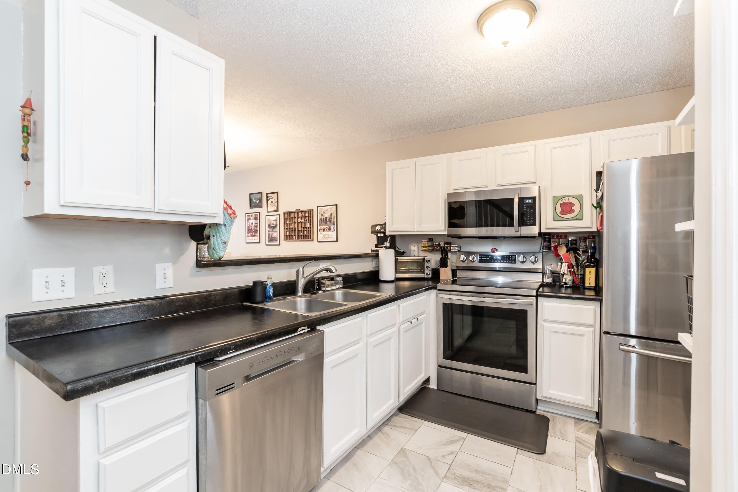 2213 Violet Bluff Court Raleigh, NC 27610 - Photo 8 of 26 Kitchen 01
