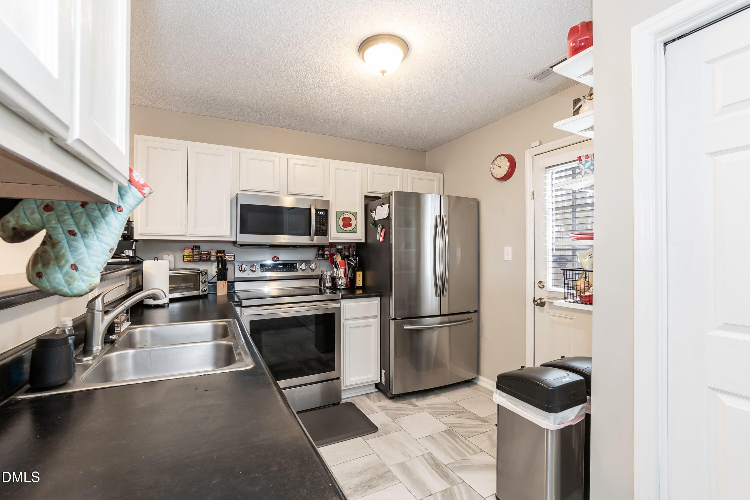 2213 Violet Bluff Court Raleigh, NC 27610 - Photo 10 of 26 Kitchen 03