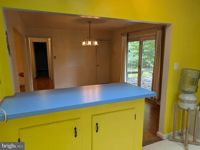 a view of a room with painted walls