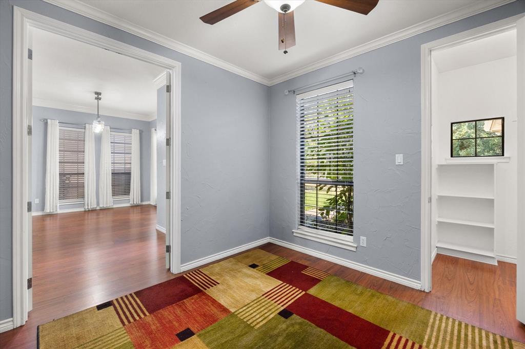 8712 Bellechase Road Granbury, TX 76049 - Photo 27 of 37 3rd Bedroom or large OFFICE-light bright & fun closet/storage! You decide. French doors open just off the entry.